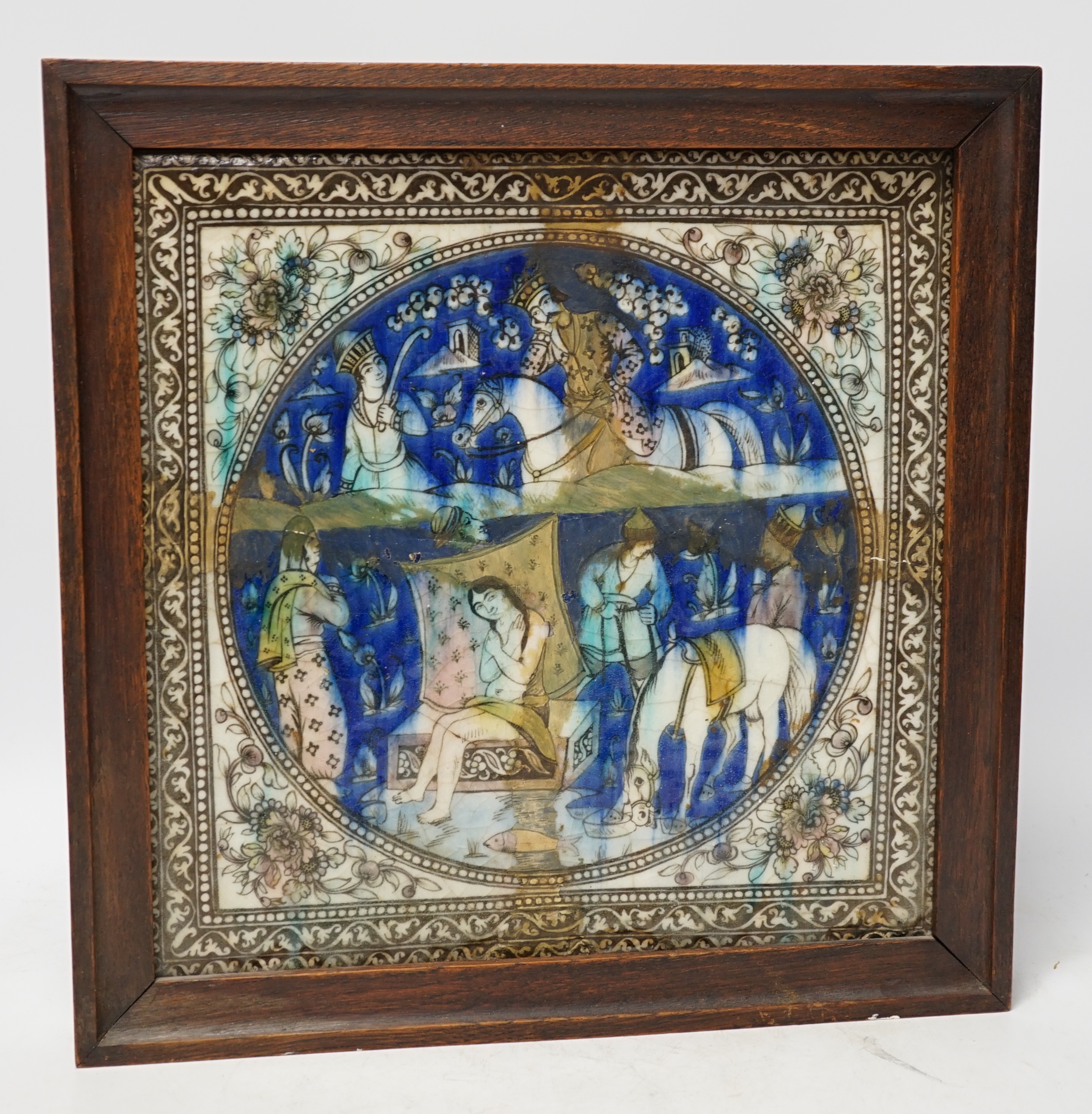 A large framed Persian fritware tile, Qajar dynasty, frame 36cm sq. Condition - heavily restored